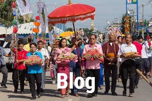 people walking in a Kathin parade